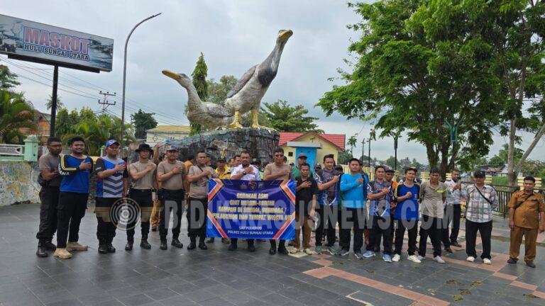 Sat Polairud Polres Hulu Sungai Utara Bersama Instansi Terkait Gelar Gerakan Asri, Bersihkan Kawasan Wisata Pinggir Sungai