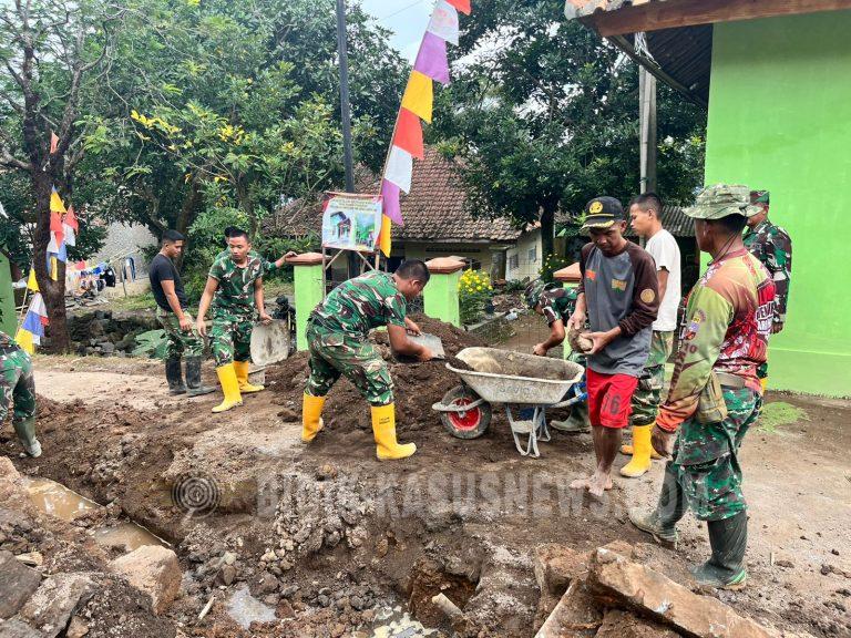 Meski Padat Kegiatan, Satgas TMMD Kodim 0617 Terus Lanjutkan Pembangunan Solokan